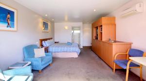 Ένα ή περισσότερα κρεβάτια σε δωμάτιο στο Anchorage Motel & Villas Lorne +39 φωτογραφίες
