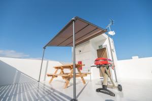 Balkón nebo terasa v ubytování ホテルトーマスみなみ