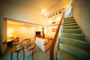 TV a/nebo společenská místnost v ubytování Hotel Io Alpheratz
