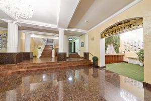 a large lobby with a sign that reads appreciation at Hotel Tsentralnaya (former Chernigov) in Bryansk