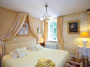 Postel nebo postele na pokoji v ubytování Chateau de la Rue