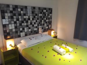 Villa Eden Rock客房内的一张或多张床位