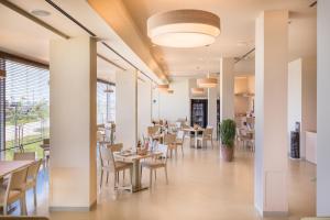 Restaurace v ubytování Hotel Baya - in centro, sul mare
