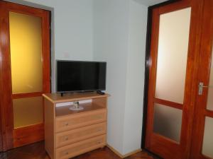 A television and/or entertainment centre at Csányi vendégház