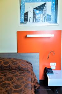 Postel nebo postele na pokoji v ubytování Hotel Fiera Rho