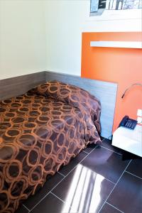 Postel nebo postele na pokoji v ubytování Hotel Fiera Rho