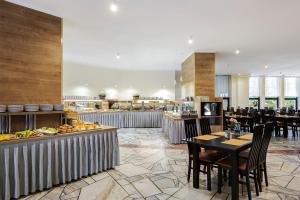 Restoranas ar kita vieta pavalgyti apgyvendinimo įstaigoje Interferie Aquapark Sport Hotel Malachit