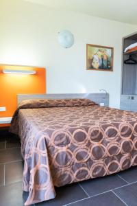 Postel nebo postele na pokoji v ubytování Hotel Fiera Rho
