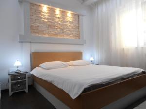 Posteľ alebo postele v izbe v ubytovaní Apartman Ines 1