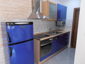 Kuchyňa alebo kuchynka v ubytovaní Apartman Ines 1 + 7 fotografií