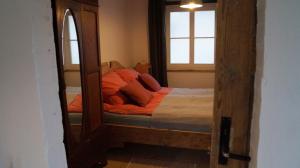 Ένα ή περισσότερα κρεβάτια σε δωμάτιο στο Ferienwohnung am See