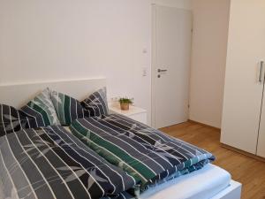Postel nebo postele na pokoji v ubytování Ferienwohnung Bergzauber