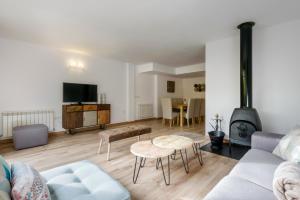 TV a/nebo společenská místnost v ubytování Chalet Casa La Cumbrecita en Panticosa + 16 fotografií