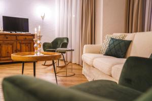 Posezení v ubytování Das Landhaus Apartments Prägant