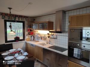Virtuvė arba virtuvėlė apgyvendinimo įstaigoje Waldhus
