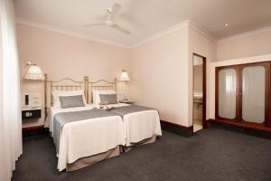 Ein Bett oder Betten in einem Zimmer der Unterkunft Hotel Continental Barcelona