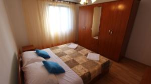 Łóżko lub łóżka w pokoju w obiekcie Apartment Turkalj