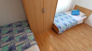Łóżko lub łóżka w pokoju w obiekcie Apartment Turkalj