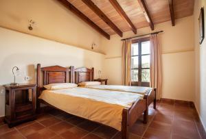 Letto o letti in una camera di Agroturismo Can Patro