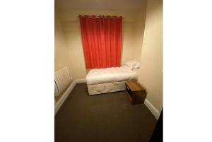 A bed or beds in a room at Newport Lodge