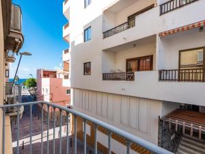 a balcony view of a building with balconies at 205 Los Cristianos by the beach, center, wifi AC in Arona