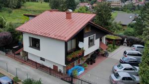 an aerial view of a house with a red roof at Willa Ewa in Szczyrk