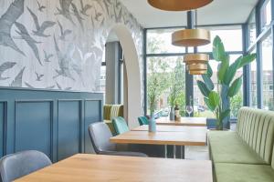 Posezení v ubytování Alp de Veenen Hotel