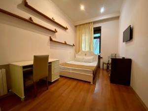 Posteľ alebo postele v izbe v ubytovaní Old City Apartment