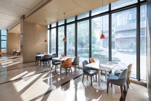 Posezení v ubytování Holiday Inn Express Shenzhen Haiyuan City by IHG