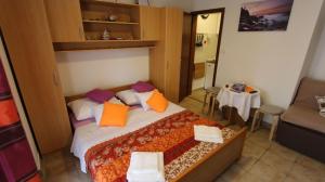 Łóżko lub łóżka w pokoju w obiekcie Apartment Kreslin