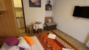 Telewizja i/lub zestaw kina domowego w obiekcie Apartment Kreslin