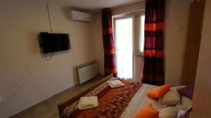 Telewizja i/lub zestaw kina domowego w obiekcie Apartment Kreslin