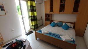 Łóżko lub łóżka w pokoju w obiekcie Apartment Kreslin