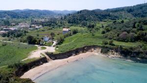 an aerial view of a beach and the ocean at Villa Spyridoula studios on the Beach in Sidari