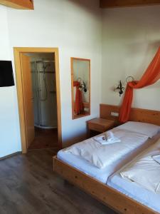 Posteľ alebo postele v izbe v ubytovaní Appartementhaus Chalet Alpina