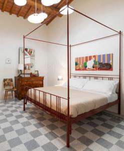 Ένα ή περισσότερα κρεβάτια σε δωμάτιο στο Residenza Villa Tosca