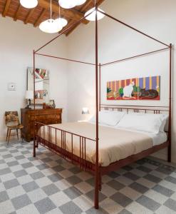 Tempat tidur dalam kamar di Residenza Villa Tosca