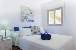 A bed or beds in a room at 080 Casa Can Xim ETV8770 by Mallorca Charme
