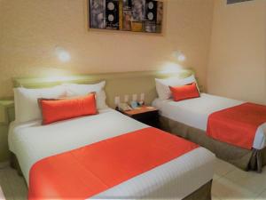 Cama o camas de una habitación en Olas Altas Inn Hotel & Spa