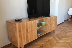 A television and/or entertainment centre at Best Location in Palermo-Buenos Aires 51m2