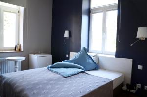 Postel nebo postele na pokoji v ubytování Le Presbytère + 16 fotografií