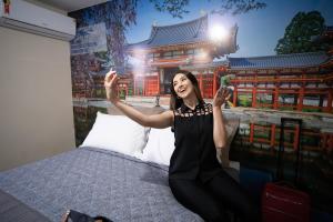 Katil atau katil-katil dalam bilik di Shelter Hostel e Pousada
