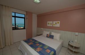 Cama ou camas em um quarto em Maredomus Hotel