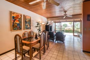 a dining room with a table and chairs at Flamingo Villa #12 in Playa Flamingo