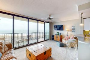a living room with a view of the ocean at Sea Colony - 502 Annapolis House in Bethany Beach