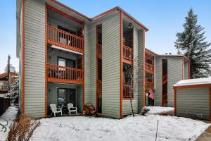 a house in the snow with two decks at The Great Escape in McCall