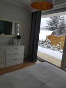 Posteľ alebo postele v izbe v ubytovaní Apartament "OldMountain" Olimpijska 1C 1