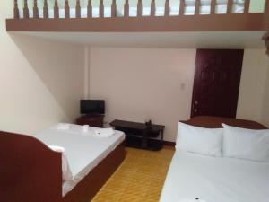 Katil atau katil-katil dalam bilik di Watermoon Beach Resort