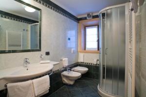 Koupelna v ubytování Hotel Capriolo