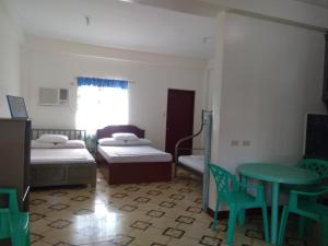 Łóżko lub łóżka w pokoju w obiekcie Watermoon Beach Resort